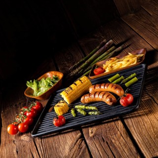 Grilled krakauer with french fries and green salad