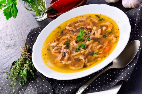 Traditional Politur-style tripe soup with beef and vegetables