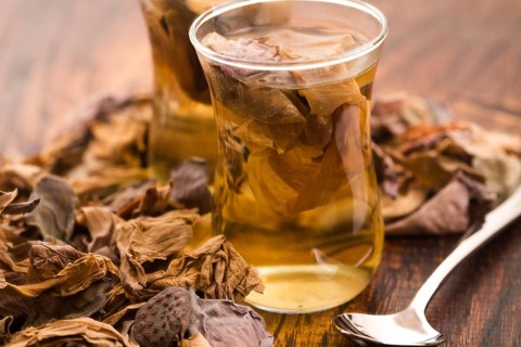 Lotus petals tea on wooden background