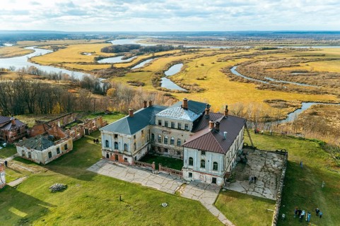 Manor house of Priklonsky Rukavishnikovs on Oka river. Aerial drone view of historical residence of