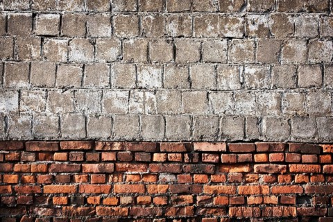 Vintage brick and concrete wall as background