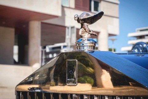 Lisbon, Portugal - Sep 29, 2024: Close-up and selective focus on the Rolls-Royce mascot hood