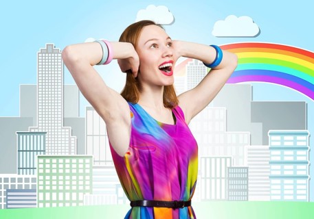 Redhead beautiful girl closing her ears with hands. Charming lady in bright colorful dress and