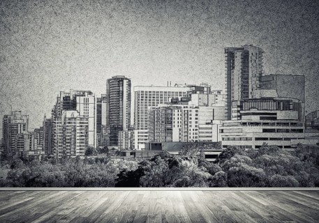 Silhouette of modern city landscape drawn on concrete wall