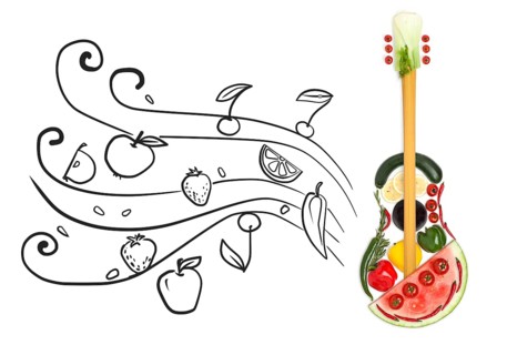 Creative photo of a standing guitar made of vegetables and fruits on a grey sketchy background of