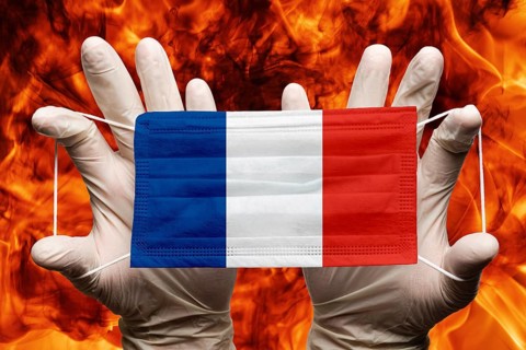 Doctor holding in white gloves protection medical face mask, respiratory bandage with France