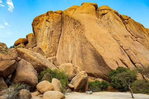Spitzkoppe is a small picturesque rock massif in Namibia. Africa. Namibia. Huge rounded boulders in