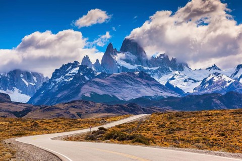 The highway crosses Patagonia and leads to majestic mountains of Fitzroy. The road through desert