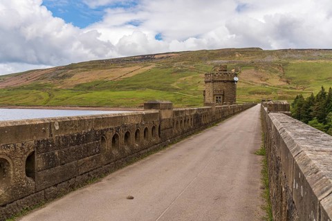 Near Middlesmoor, North Yorkshire, England, UK, May 19, 2019: The road over the dam of the Scar