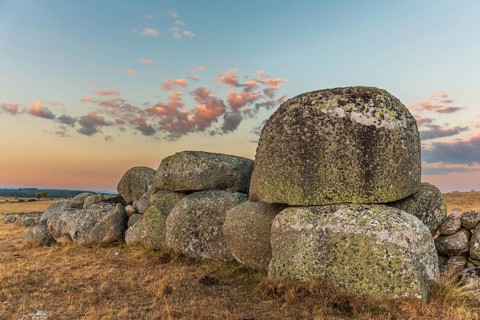 Rocks in the landscape at sunset. Aubrac, France, Europe