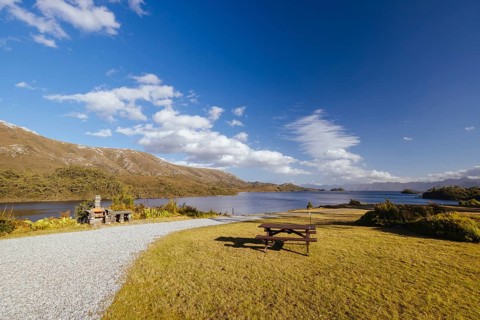 The picturesque landscape from Lake Pedder Wilderness Lodge over Lake Pedder on a hot summer's