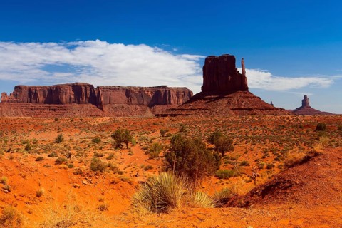Iconic peaks of rock formations in the Navajo Park of Monument Valley in Utah