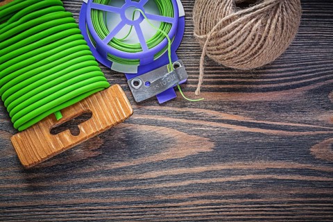 Soft twist tie hank of rope on wooden board agriculture concept