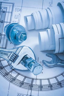 Adjustable key spanner bolts nuts and construction plans maintenance concept