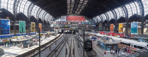 Hamburg, Germany, July 21, 2016: People waiting for trains at the central station, Europe