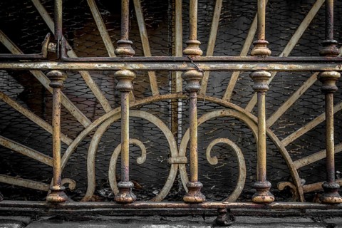 Decorations end 800 of an old Italian industrial railing