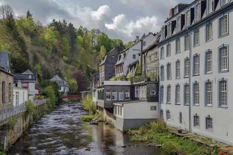 Picturesque houses along the Rur River in the historic center of Monschau, Germany, Europe