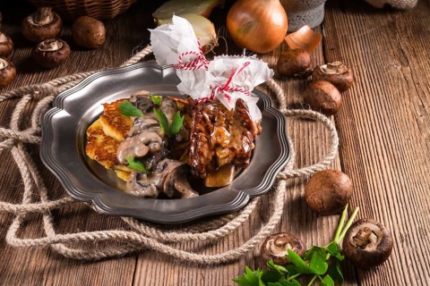 Grilled ribs with potato pancakes