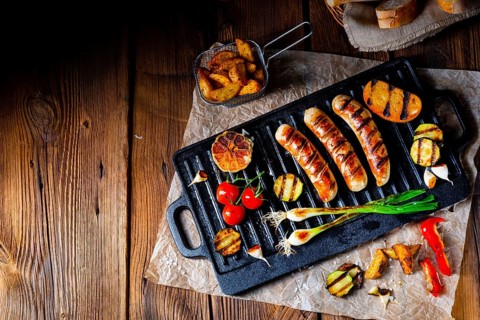 Delicious grilled sausage with various grilled vegetables