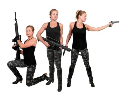 Beautiful young woman soldier with a pistol and rifle