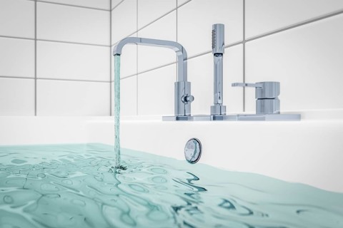 3d illustration of filling a typical bathtub with water