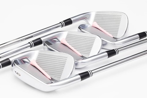 Titanium golf clubs on the white background