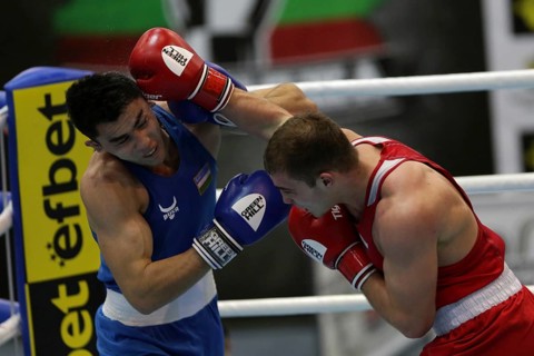 Sofia, Bulgaria. 27th February, 2021. Ruslan Kolesnikov (red) of Russia and Dilshodbek Ruzmetov of