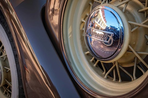 Lisbon, Portugal - Sep 29, 2024: Close-up and selective focus of spare wire wheel and wheel center