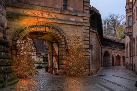 Handwerkerhof, former armoury at the Königstor, city wall, Christmas trees, Christmas lights,