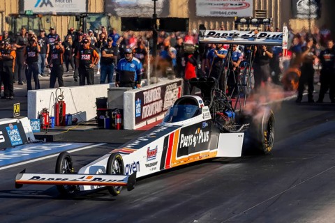 NHRA driver, Clay Millican, prepares to qualify for the Dodge Power Brokers NHRA Mile-High