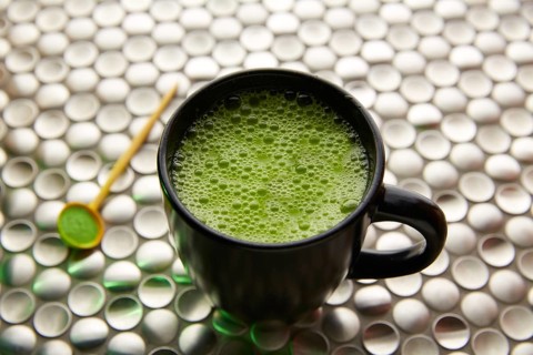 Matcha green tea from Japan on modern stainless steel background