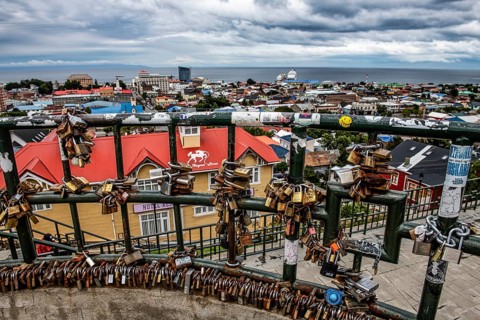Love locks on a fence, viewpoint over Punta Arenas, Patagonia, Chile, South America
