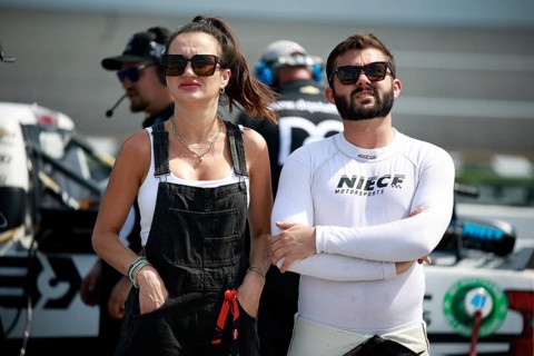 Bayley Currey walks pit road before qualifying for the Clean Harbors 250 in Richmond, VA, USA,