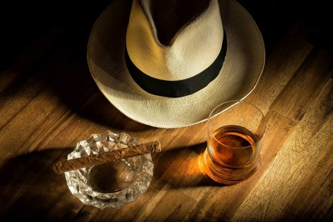 Cigar, rum and Panama hat