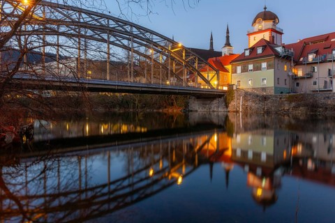 Waasenbrücke, Schwammerlturm, historic buildings of the old town are reflected in the river Mur,