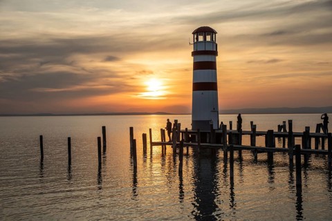 Footbridge to the lighthouse at sunset, Podersdorf am See, Lake Neusiedl, long exposure,