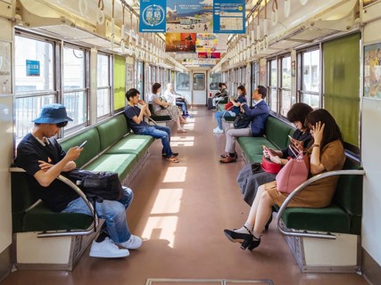 Kyoto, Japan - May 13 2019: People on a train near Sanjo Train Station in Kyoto, Japan, Asia