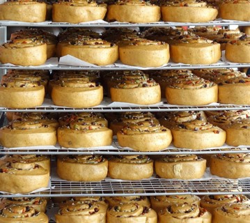 Chinese steamed buns with dried fruits and nuts on cooling racks