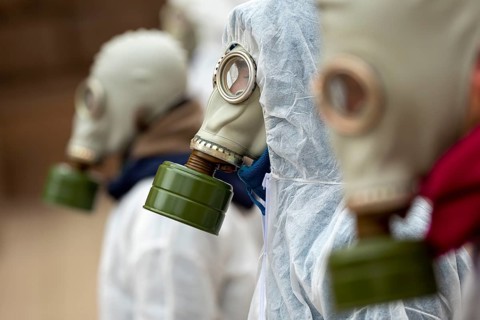 Environmentalists protest against Bulgaria's minks fur farms wearing gas masks