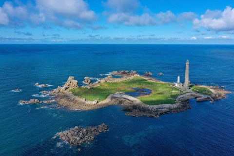 Aerial view island Ile Vierge with lighthouses Phare de l'Ile Vierge, old lighthouse from 1845 and