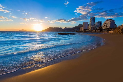 Calpe Alicante sunset at beach Cantal Roig in Mediterranean Spain
