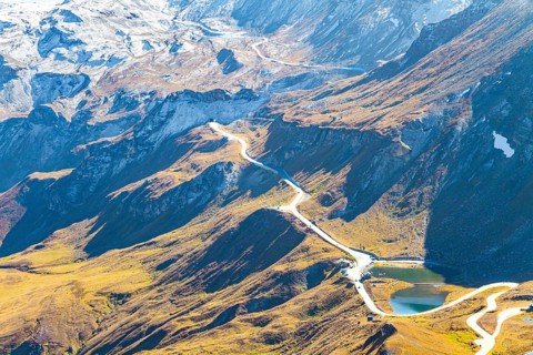 The mountain serpentine of the panoramic mountain road Grossglocknerstrasse. The Hohe Tauern Park.