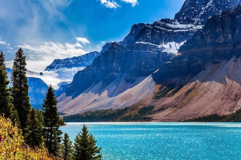 The Rockies of Canada. The picturesque huge and deep Lake Bow is surrounded by cliffs and glaciers.