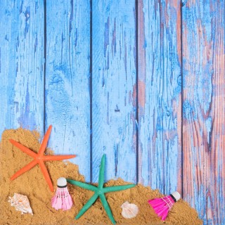 Beach poster on wooden background with starfishes and shells