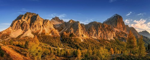 Lagazuoi mountain in the light of the setting sun near Passo Falzarego Autumn colors of the