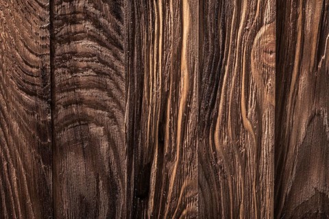Vertical version old texture of brown wood boards