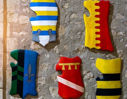 The medieval shields inside an ancient castle