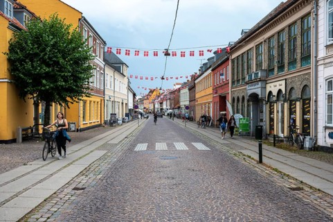 Koge, Seeland, Denmark, July 23, 2024 - Colorful historical houses at the main shopping street of