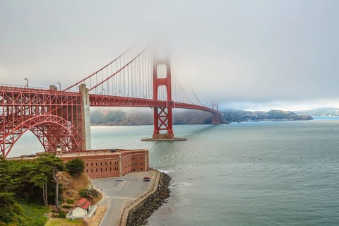 Aerial view of Golden Gate Bridge from Fort Point, south shore, symbol, icon and landmark of San