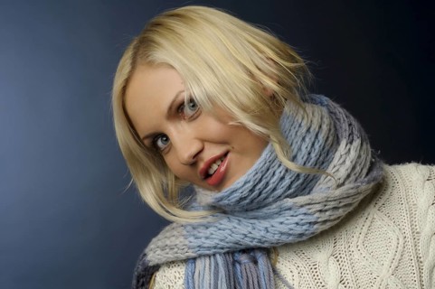 Pretty blonde girl in winter clothes with jumper, scarf and gloves, St. Petersburg, Russia, Europe